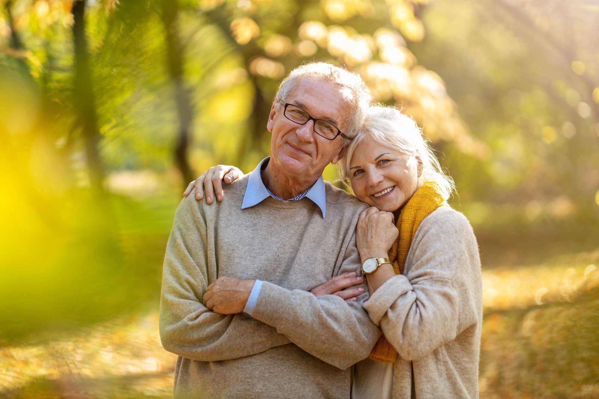 happy-senior-couple-in-autumn-park